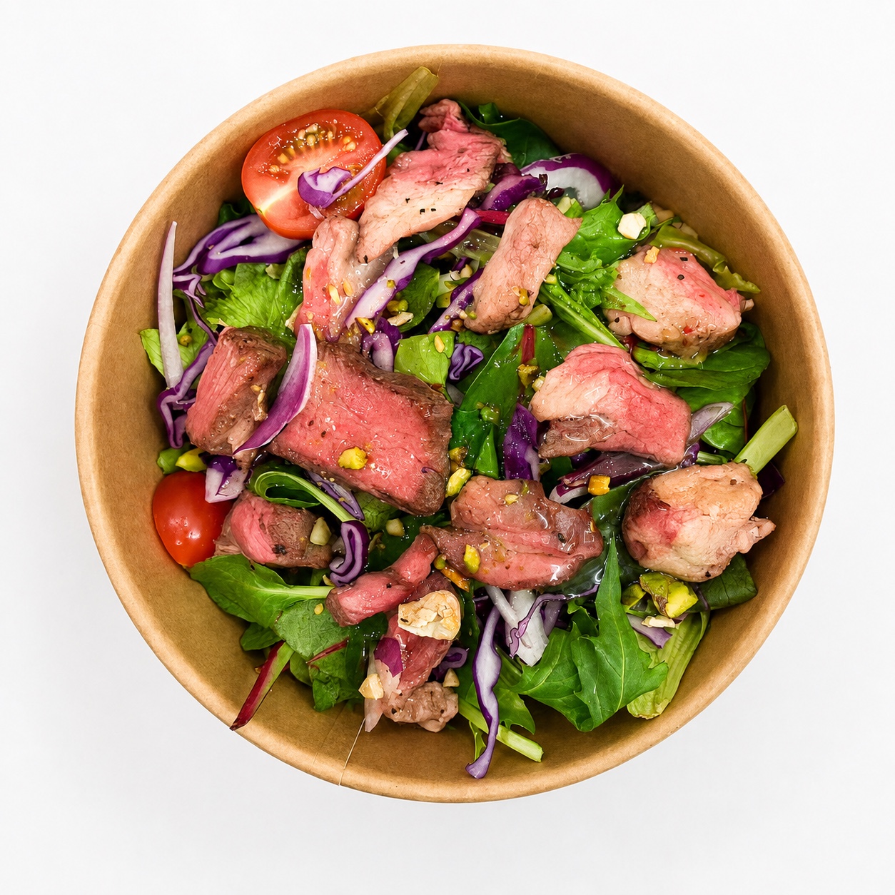 Thai beef salad with fresh leaves and colourful vegetables